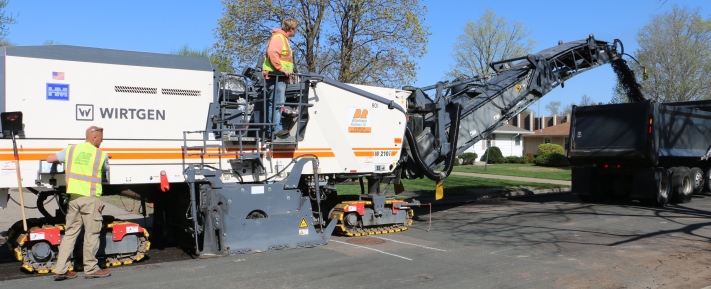 Mill and Overlay Asphalt Services Laying Asphalt Over Existing Asphalt in Minnesota